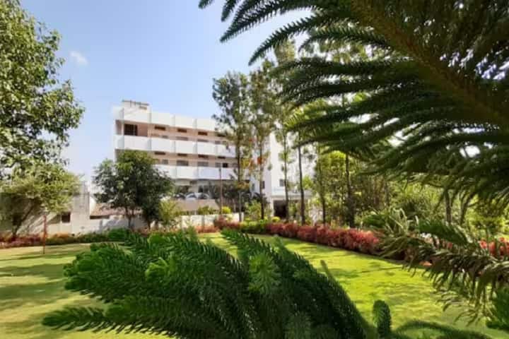 Rani Chennamma College of Pharmacy campus in Belgaum, Karnataka, India — photo 1